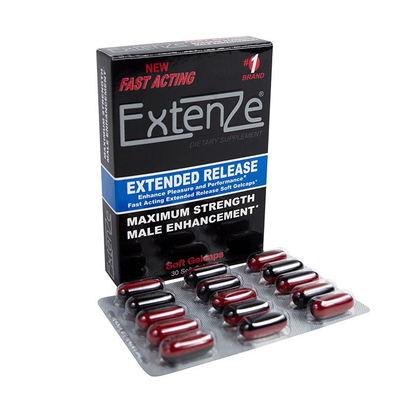 A bottle of Extenze supplement alongside natural ingredients like ginseng and tribulus terrestris on a wooden table.