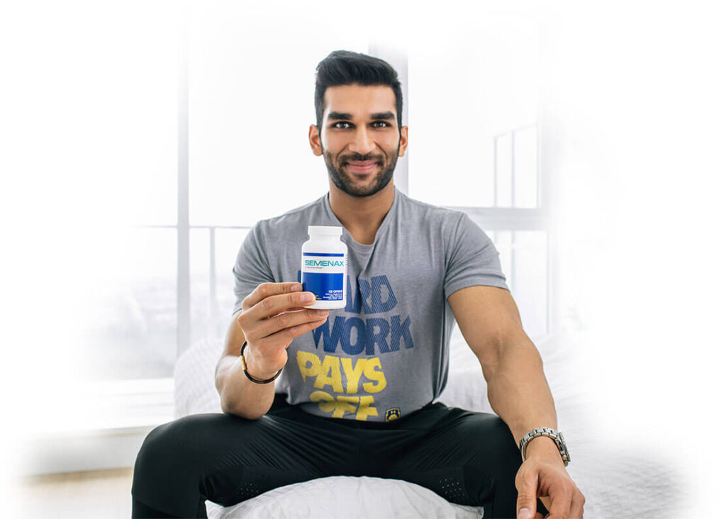 Confident man smiling after improved reproductive health with Semenax® supplement.